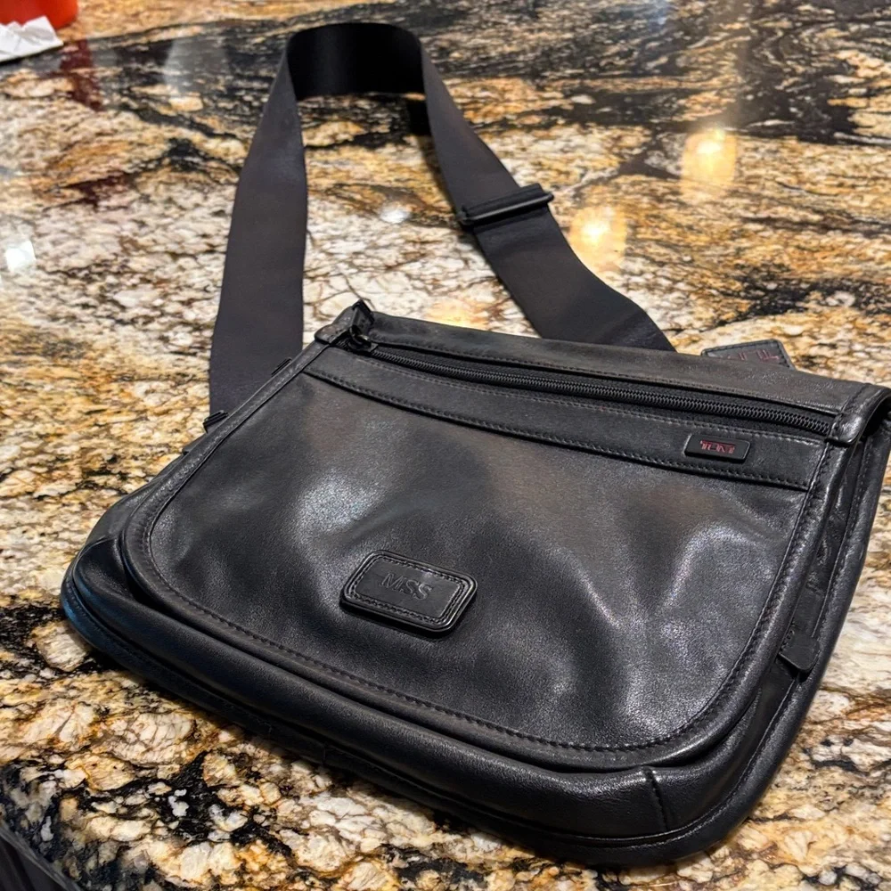Tumi Black Leather Crossbody Messenger Bag with Adjustable Web Strap